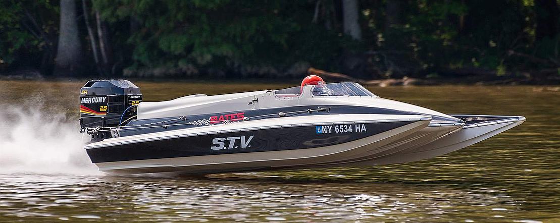 Speed boat on water with mercury outboard motor and Brucato ACU 